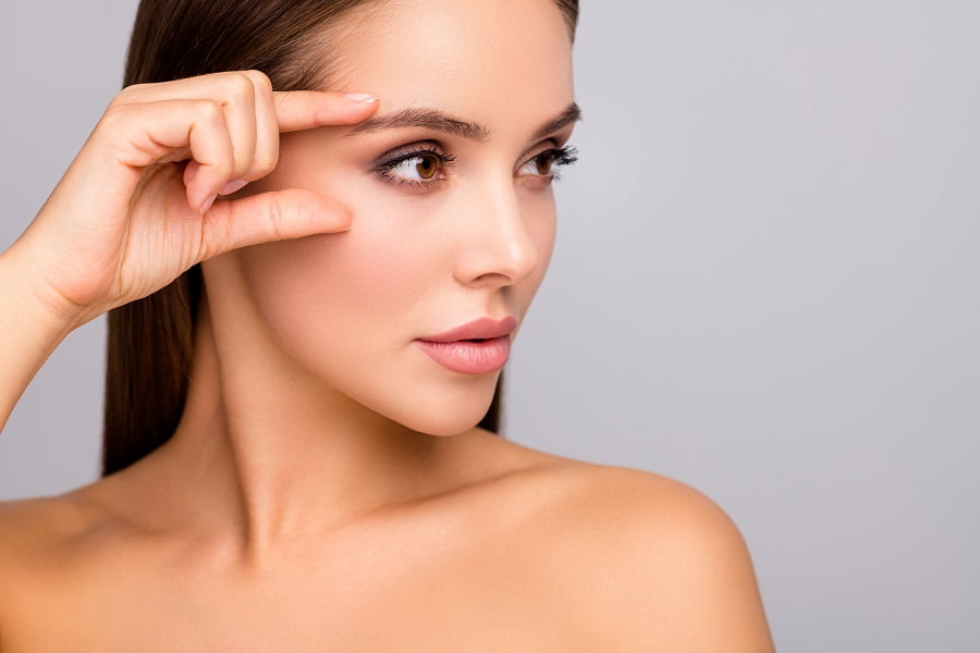 Good looking woman with her beautiful eyes | Get Eye lift at Dr. Leonard Grossman M.D. | New York