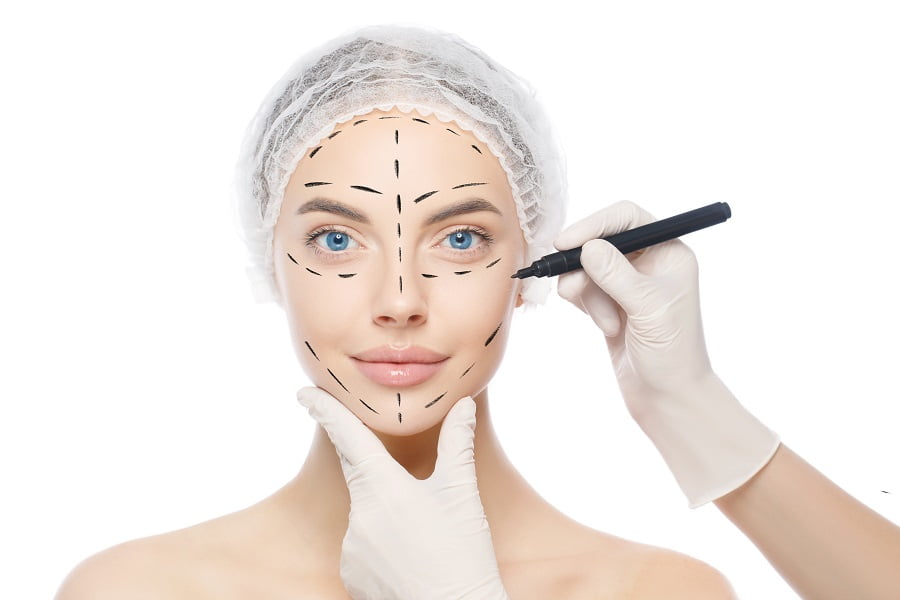Woman preparing for beauty surgery | Get Chin and Nose Surgery at Dr. Leonard Grossman M.D. | New York