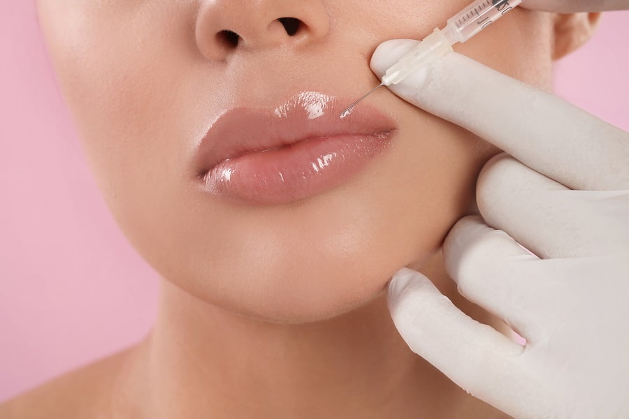 Girl getting Lip filler treatment | Get Lip Filler treatment at Dr. Leonard Grossman M.D. | New York