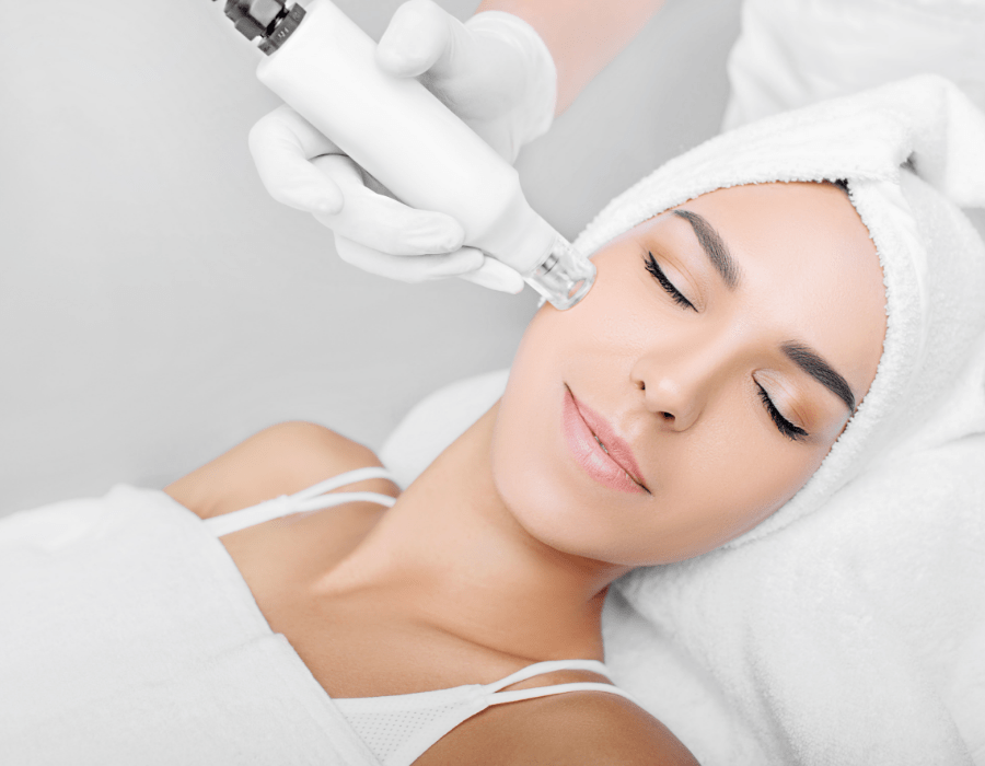 Girl getting facial treatment | Fat Transfer and Facial Rejuvenation at Dr. Leonard Grossman M.D. | New York