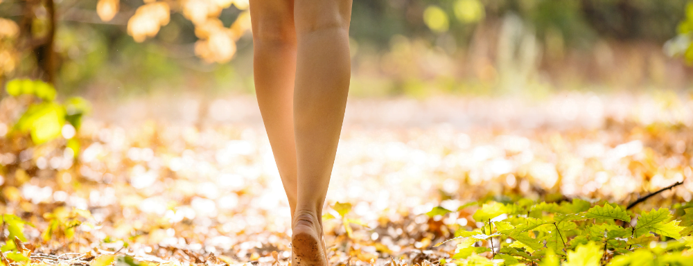A Girl walking on street | Get Calf Augmentation with Fat Grafting at Dr. Leonard Grossman M.D. | New York